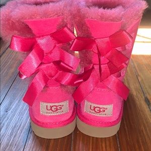 UGG girls’ pink boots with bows
